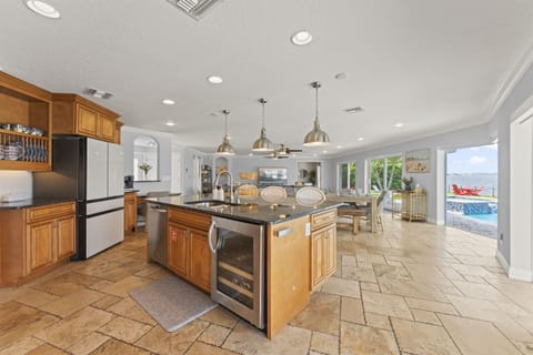 Well appointed kitchen with island bar seating