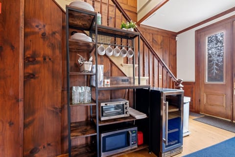 Kitchenette with mini-fridge, toaster oven, microwave, dishes and utensils, etc.