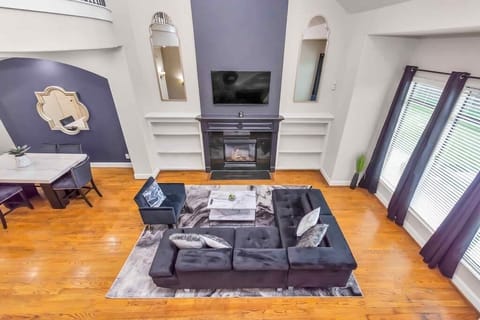 The family room is Unit 127 features boastful 20 foot ceilings 