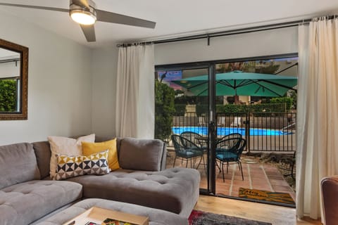 Nighttime view of the back patio and pool