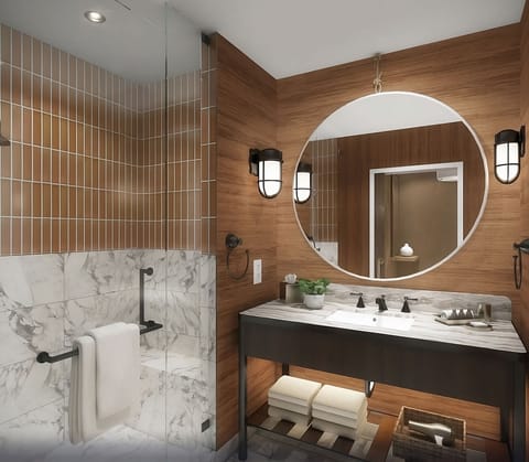 Refresh in a spa-like bath with marble and glow.