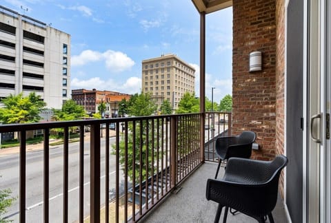 Sit out here and watch the world buzz by