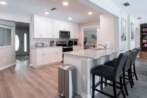 Kitchen with Bar Chairs