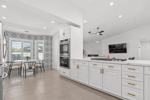 Large open kitchen with breakfast nook 