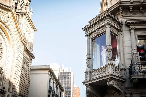 Arrive inspired by elegant architecture in a vibrant city setting.