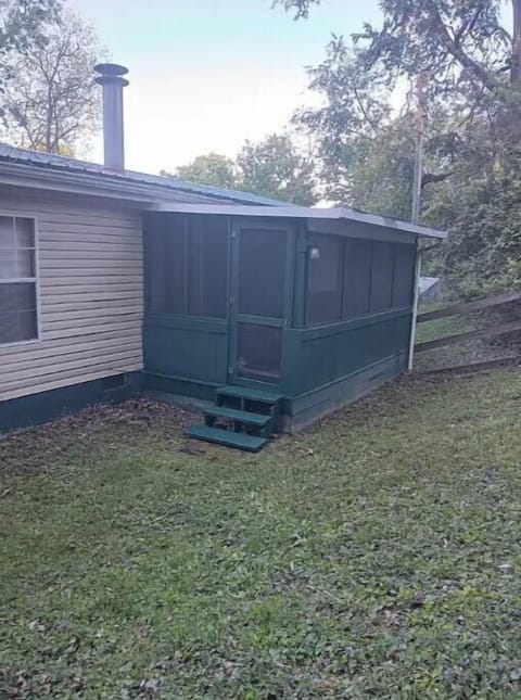 Backyard look at outside of screen room