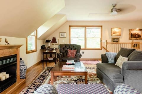 Light-filled great room with mantel