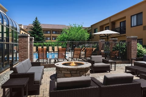 Linger longer on the patio with warm firelight and seating.