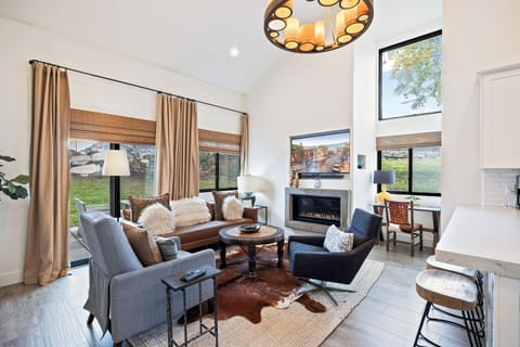 Comfortable seating and natural light create the perfect space for relaxing or gathering with friends and family.