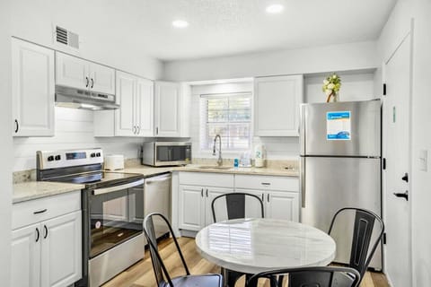 The kitchen is conveniently accessible from the dining area