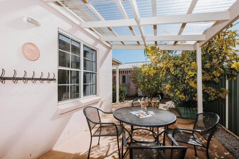 Experience the best of outdoor dining while sizzling up a BBQ feast on the back patio.