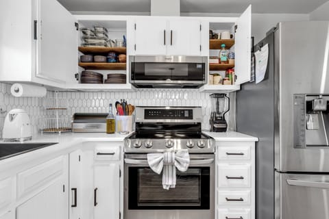 Plates, bowls, cups/mugs and cutlery provided.