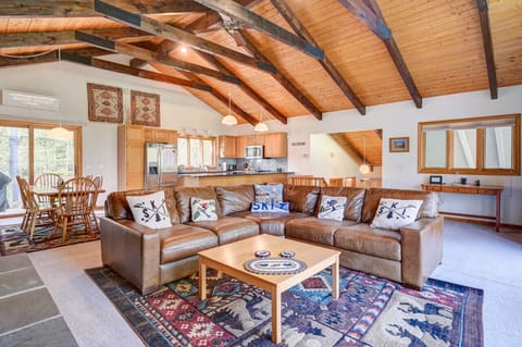 Spacious open floor den area where families can sit back and relax with a nice fire.