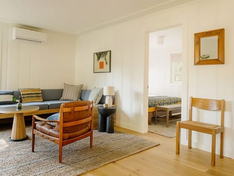 Lounge comfortably in a sunny living room made for relaxing.