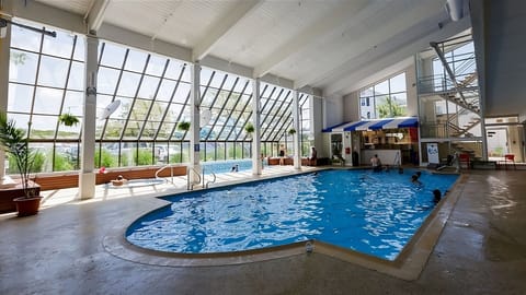 Dive into the sunlit indoor pool for year-round bliss.