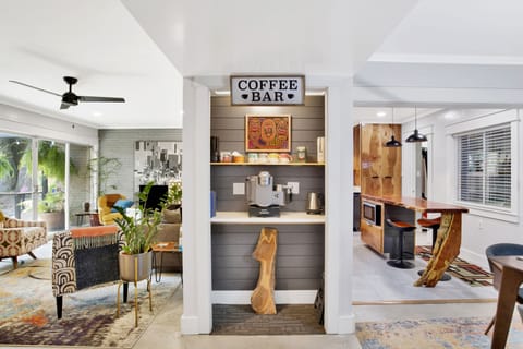 Well stocked coffee/tea bar between the living room and kitchen.