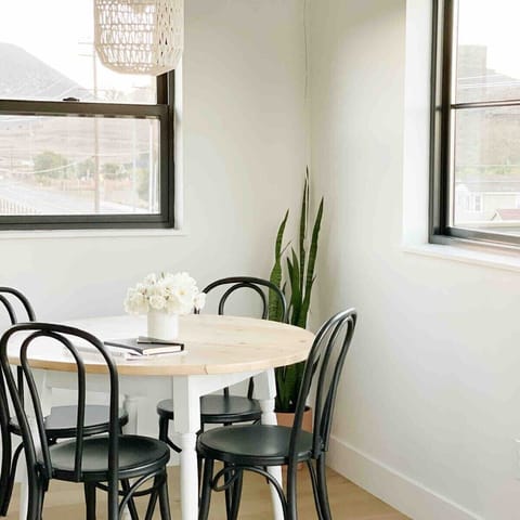 A dining nook that doubles as a home office during the day.  That is if you can work without being too distracted by the views!