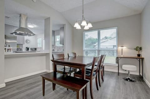 A Study Desk Gracefully Occupying a Corner of the Dining Room