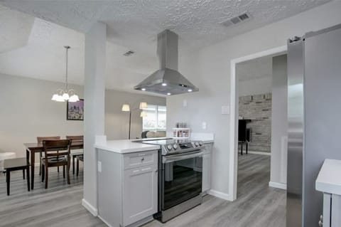 Standing in the Kitchen, Gazing into the Dining Room