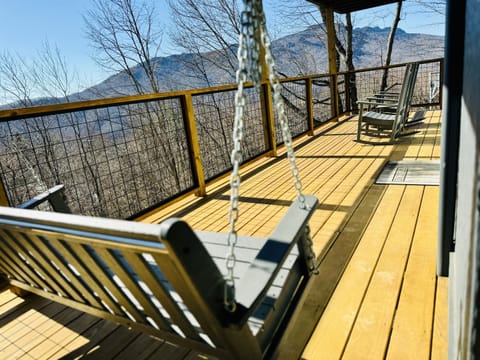 Porch Swinging & Rocking Chairs are so relaxing...especially with this seasonal "famous" Grandfather Mountain Profile View & the treehouse-feeling of our porches!