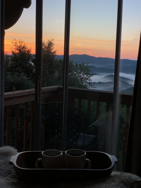 Whether you get lucky for a "cloud inversion" or "just a normal sunrise," the view from our Top Floor View Bedroom can hardly be beat. Slow mornings watching the sunrise are so peaceful! Long-range panoramic mountain & valley views