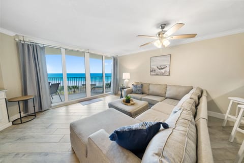 Sink into this plush sectional while breathtaking ocean views fill your living room through floor-to-ceiling windows.