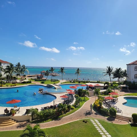 Beautiful view of main pool and ocean from patio