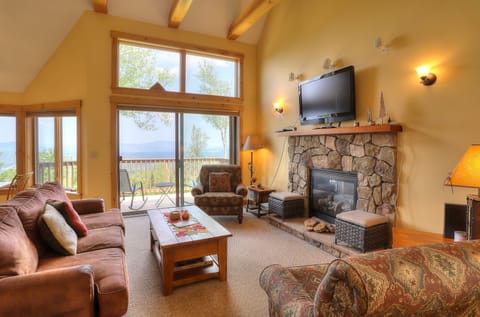 Warm and cozy living area with gorgeous mountain and lake views