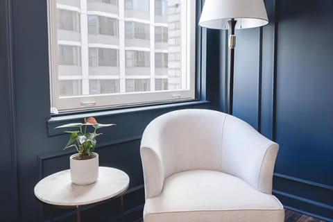 Sip coffee by the window in a cozy reading nook.
