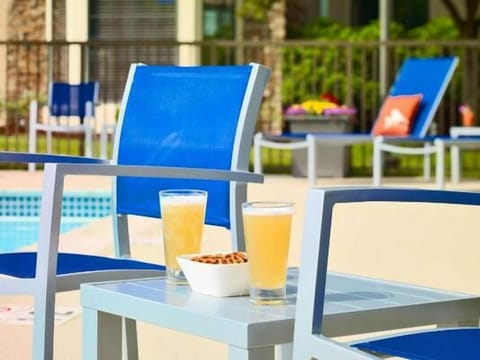 Soak up sunshine poolside with refreshing drinks and loungers.