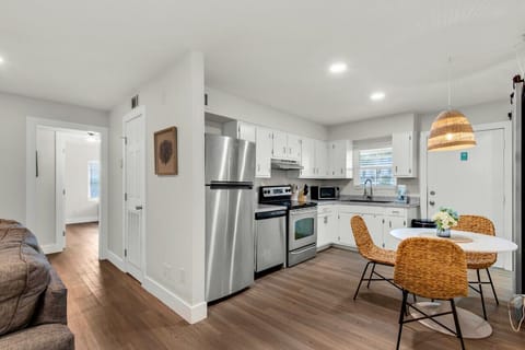 This dining space is designed to comfortably accommodate three guests
