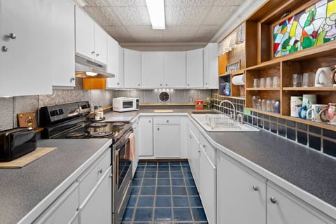 Cook up with our spacious countertop and top-notch appliances