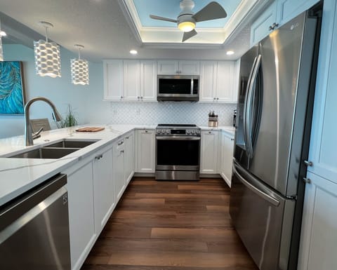 Renovated and fully equipped kitchen with all the necessities an - Renovated and fully equipped kitchen with all the necessities and extras you could need to cook your favorite meals and snacks.