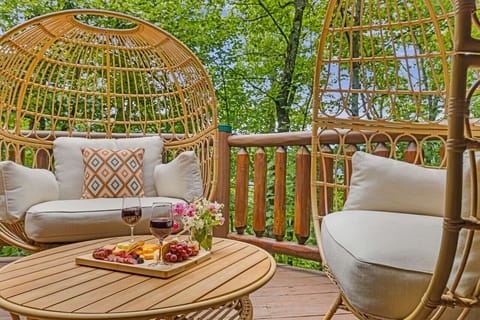 Lounge on the upper balcony in these comfy bucket chairs while sipping and snacking on your favorites!