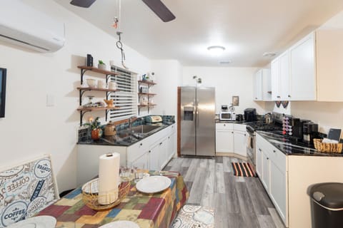 Full kitchen and dining area. 