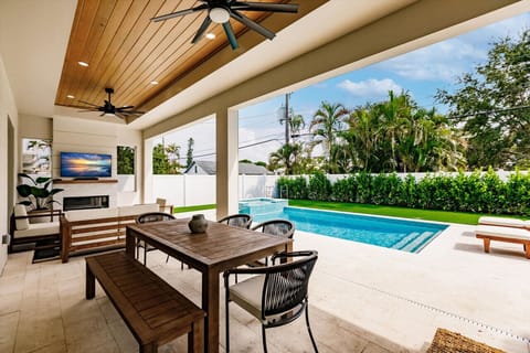 Lanai, Motorized Screens, BBQ, Outdoor Living and Dining..