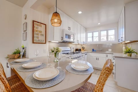 Kitchen has counter top seating and everything you need to prepare a meal at home!