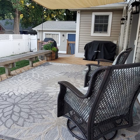 Back yard deck with smoker grill and blackstone