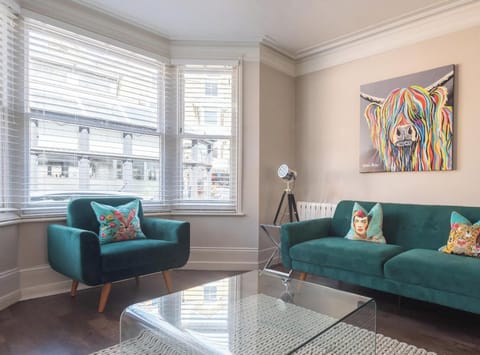 Comfortable sofa bed with additional arm chair, perfect for the third guest / child