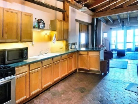 North galley kitchen with view to North Living Room and private patio