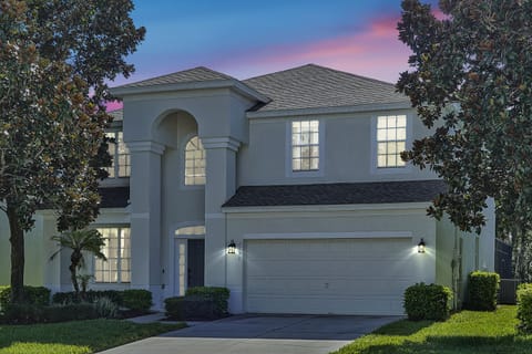 Drive down the beautiful tree-lined street to our home and conveniently park directly in front of the house in the driveway.