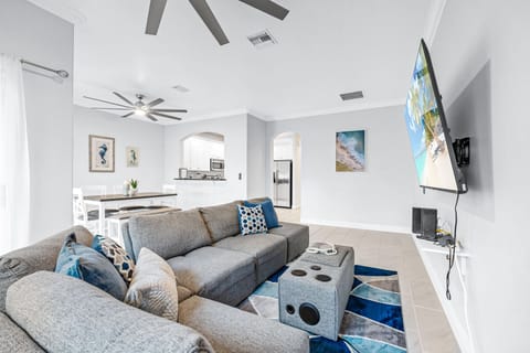 Comfortable living room with flatscreen TV.