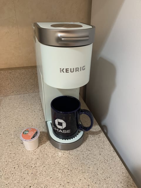 Keurig coffee machine makes any flavor of coffee quickly & easily.