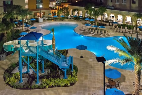 Soak up the lively pool deck with waterslide fun.