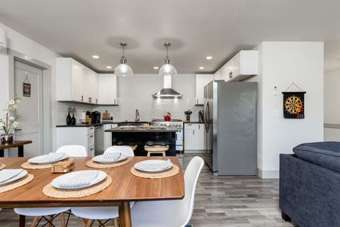 A kitchen and dining area that blend style and functionality seamlessly.