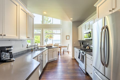 Fully-equipped kitchen with modern appliances.