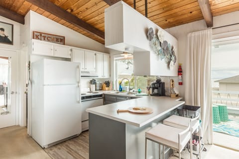 Fully-equipped kitchen with modern appliances and everything you need.