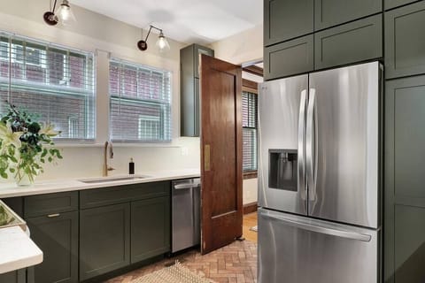 Double door fridge with 2 ice makers.