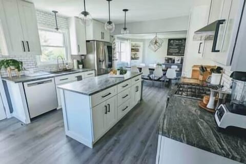 Fully stocked kitchen with utensils, dishes, cookware, etc. 