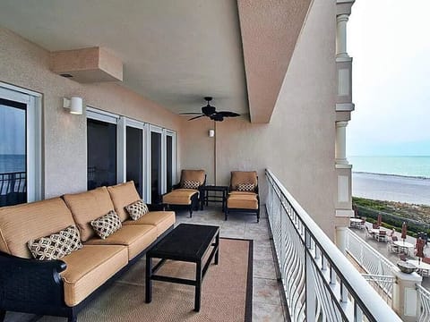 Upscale outdoor furniture with oversized cushions.